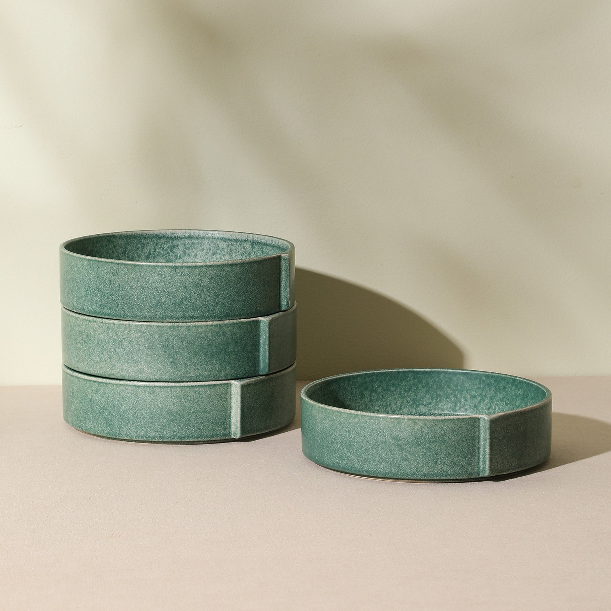 mercvo mercvoware Pasta Bowl - Green: A mercvo of Shallow Circular Ceramic Bowls with Textured Glaze, Functional Notch, and Versatile Uses